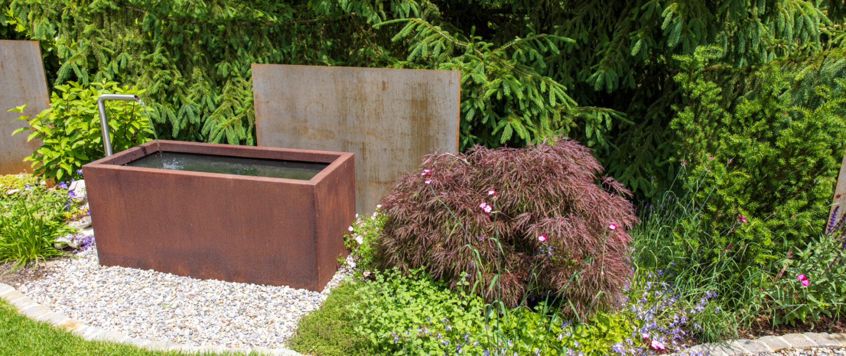 Gartenumgestaltung in Reitnau nachher Brunnen